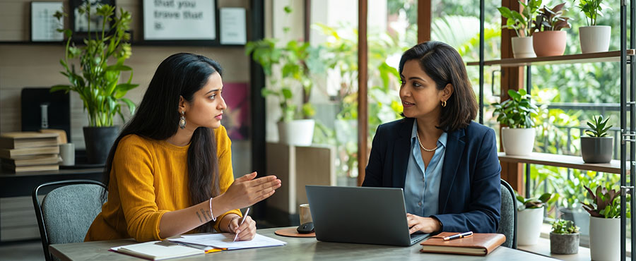 Admission counselor in conversation with a prospective student